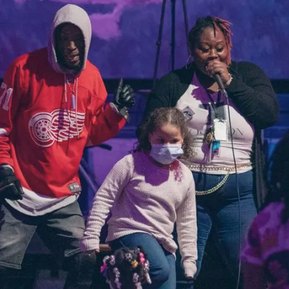 Founder of Holism Haus singing